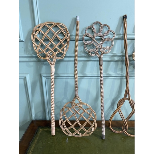 517 - Set of six early 20th C. wicker carpet beaters {Approx. 78 cm H}.