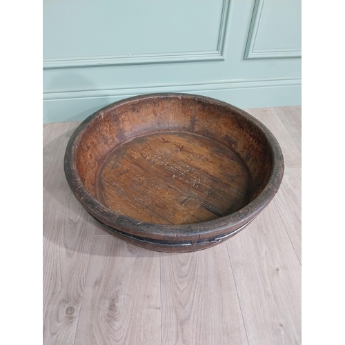 521 - Two wooden and metal bound bowls {16 cm H x 65 cm Dia. AND 16 cm H x 59 cm Dia.}.