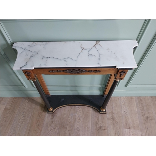 522 - Good quality French gilt and ebonised console table with marble top raised on platform base in the E... 