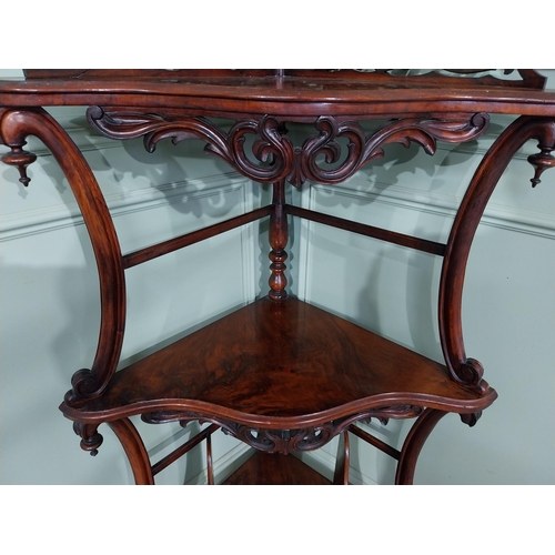 529 - Good quality Victorian walnut corner whatnot with gallery back, serpentine front and three tiers rai... 