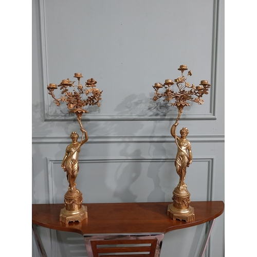 542 - Pair of good quality French gilded brass candelabras decorated with flowers held aloft by Ladies {74... 