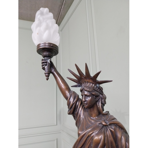 544 - Bronze statuette of the Statue of Liberty with glass shade mounted on marble plinth {100 cm H x 40 c... 