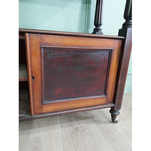 551 - Victorian mahogany dumbwaiter on reeded columns above two doors raised on turned legs {127 cm H x 12... 