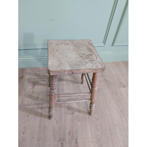 554 - Two early 20th C. pine stools raised on turned legs {60 cm H x 38 cm W x 30 cm D and 33 cm H x 22 cm... 