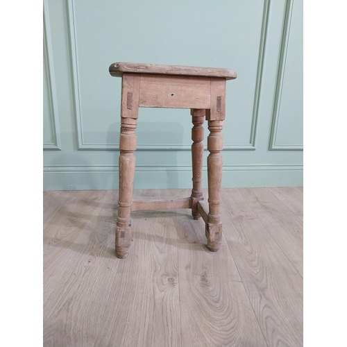 554 - Two early 20th C. pine stools raised on turned legs {60 cm H x 38 cm W x 30 cm D and 33 cm H x 22 cm... 