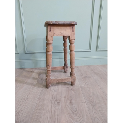 554 - Two early 20th C. pine stools raised on turned legs {60 cm H x 38 cm W x 30 cm D and 33 cm H x 22 cm... 