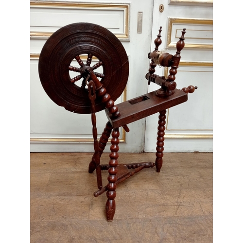 555 - 19th C. wooden spinning wheel with turned bobbin legs and intricate detailing {H 82cm x W 75cm x D 4... 