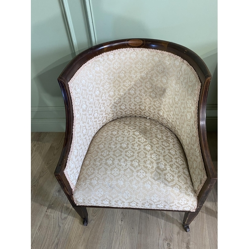 562 - Pair of Edwardian mahogany and satinwood inlaid upholstered armchairs raised on square tapered legs ... 