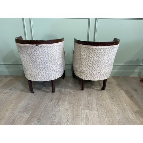 562 - Pair of Edwardian mahogany and satinwood inlaid upholstered armchairs raised on square tapered legs ... 