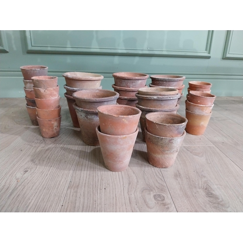 570 - Large collection of terracotta plant pots {Largest 11 cm H x 20 cm Dia. AND 5.5 cm H x 6 cm Dia.}.