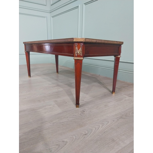 579 - Edwardian French mahogany coffee table with marble top and ormolu mounts raised on tapered legs {47 ... 