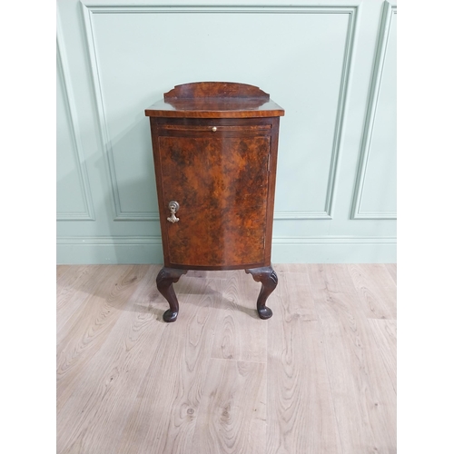 593 - Edwardian burr walnut bedside cabinet with single drawer and brushing slide raised on cabriole legs ... 