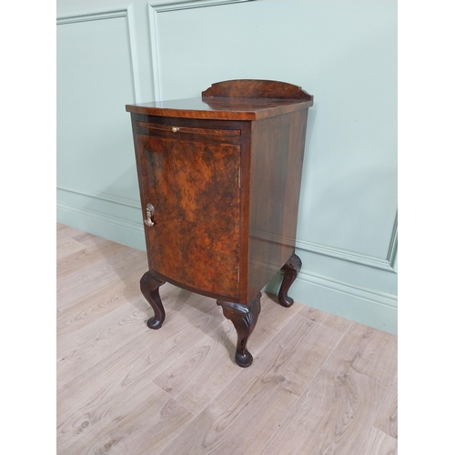 593 - Edwardian burr walnut bedside cabinet with single drawer and brushing slide raised on cabriole legs ... 