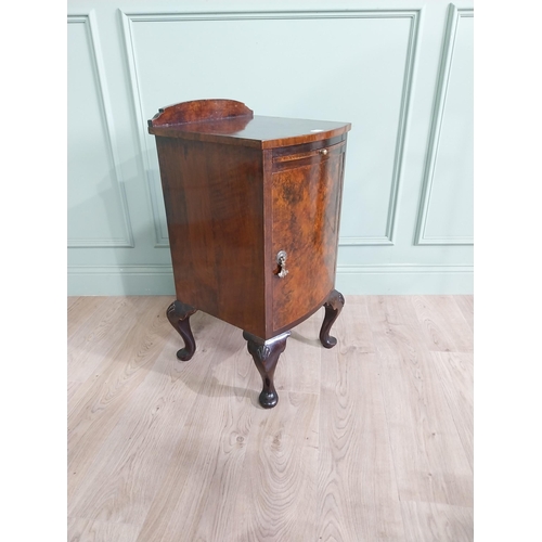 593 - Edwardian burr walnut bedside cabinet with single drawer and brushing slide raised on cabriole legs ... 