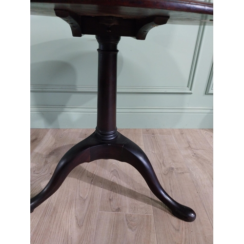 596 - Irish Georgian mahogany tilt top occasional table with dished top raised on turned column and three ... 