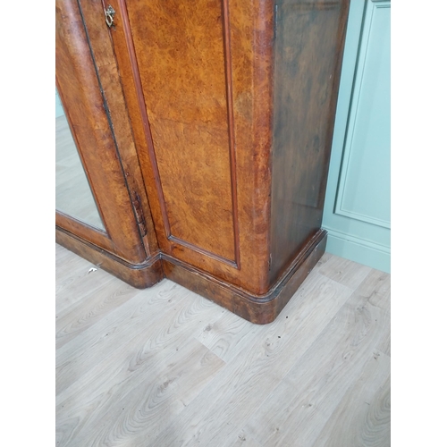 600 - Good quality burr walnut breakfront arch top wardrobe with one mirrored door flanked by two blind do... 