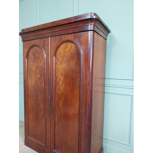 601 - 19th C. mahogany two door wardrobe with single long drawer raised on platform base {215 cm H x 150 c... 