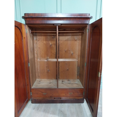 601 - 19th C. mahogany two door wardrobe with single long drawer raised on platform base {215 cm H x 150 c... 