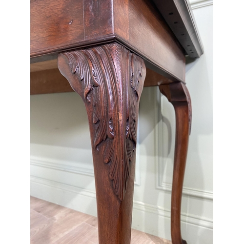 608 - Edwardian mahogany console table raised on carved cabriole legs {87 cm H x 168 cm W x 69 cm D}.