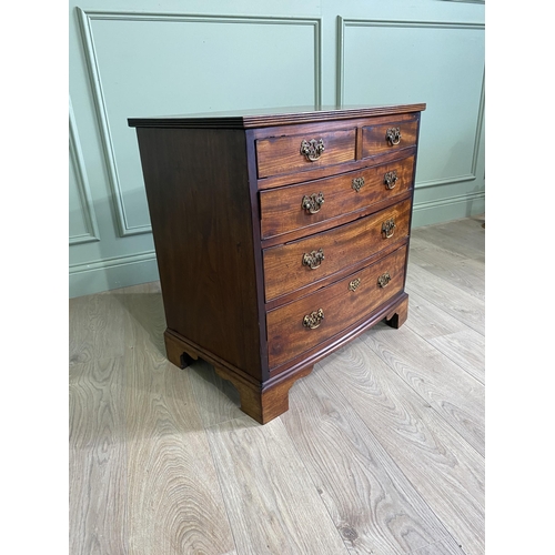 612 - Early 19th C. mahogany chest of drawers with two short drawers over three long graduated drawers rai... 