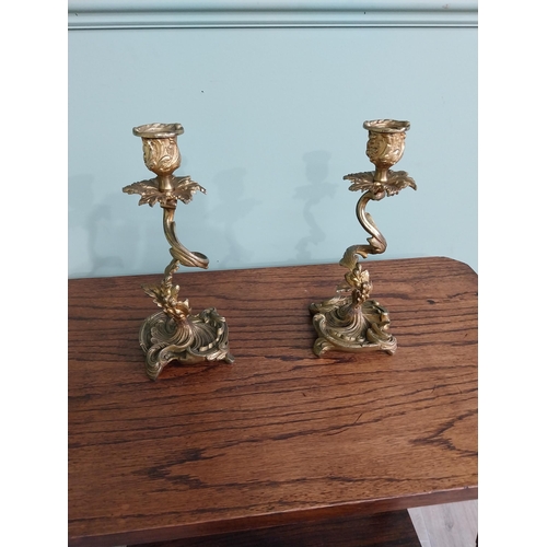 63 - Pair of gilded bronze candlesticks in the Rococo style {23 cm H x 10 cm W x 9 cm D}.