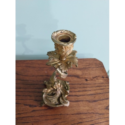 63 - Pair of gilded bronze candlesticks in the Rococo style {23 cm H x 10 cm W x 9 cm D}.