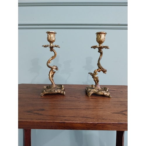 63 - Pair of gilded bronze candlesticks in the Rococo style {23 cm H x 10 cm W x 9 cm D}.