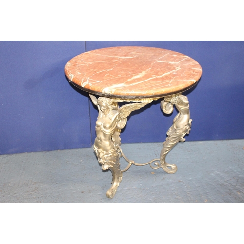 630 - Bronze marble top table, the bronze legs in the form of angels holding the round marble top {H 84cm ... 