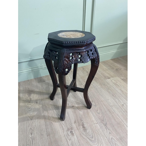 632 - Oriental carved hard wood jardinière stand with inset marble top {62 cm H x 37 cm Dia.}.