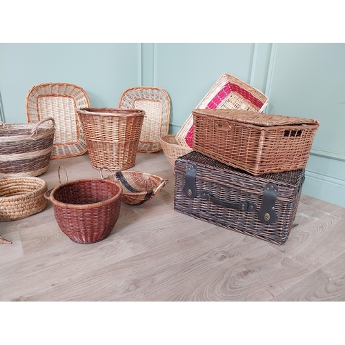 639 - Large collection of wicker baskets.