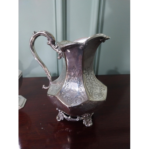 64 - Three pieces of silverplate - milk jug, pepper shaker and chocolate jug {18 cm H x 20 cm W x 11 cm D... 