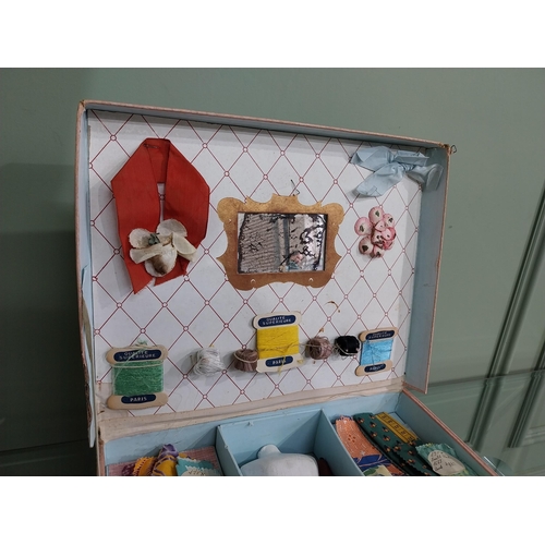 646 - French child's haberdashery set in case {11 cm H x 33 cm W x 28 cm D}.