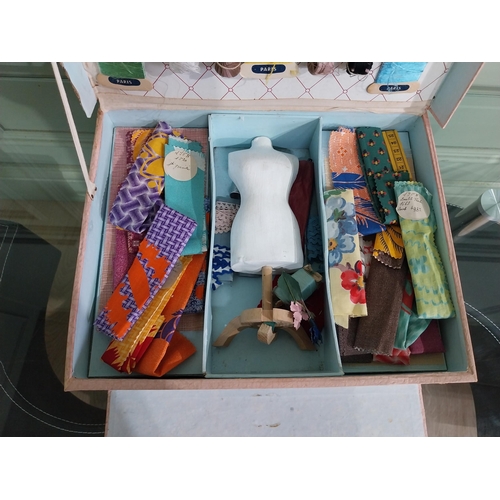 646 - French child's haberdashery set in case {11 cm H x 33 cm W x 28 cm D}.