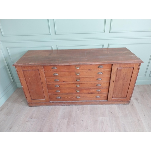 654 - Early 20th C. pitch pine Architects cabinet and drawers with six long drawers flanked by two blind d... 