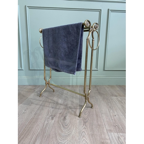 66 - Good quality Edwardian brass towel rail {75 cm H x 62 cm W x 18 cm D}.