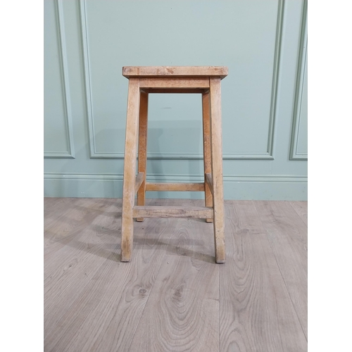 667 - Two early 20th C. pine stools {61 cm H x 33 cm W x 30 cm D and 61 cm H x 33 cm W x 31 cm D}.