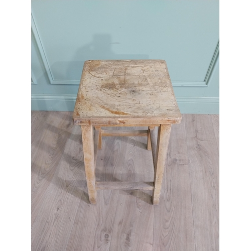 667 - Two early 20th C. pine stools {61 cm H x 33 cm W x 30 cm D and 61 cm H x 33 cm W x 31 cm D}.