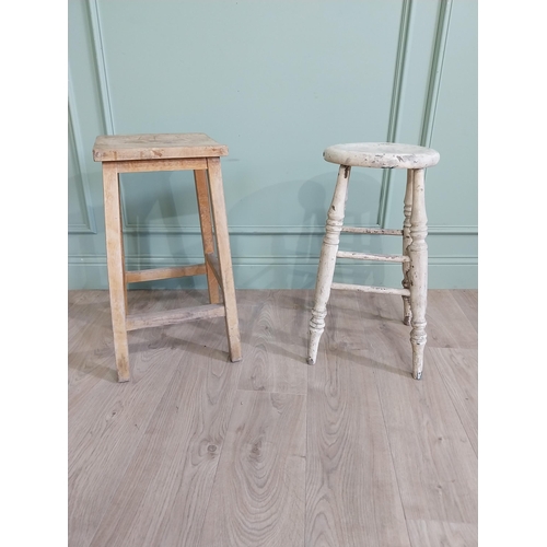 667 - Two early 20th C. pine stools {61 cm H x 33 cm W x 30 cm D and 61 cm H x 33 cm W x 31 cm D}.