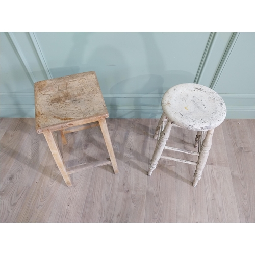 667 - Two early 20th C. pine stools {61 cm H x 33 cm W x 30 cm D and 61 cm H x 33 cm W x 31 cm D}.