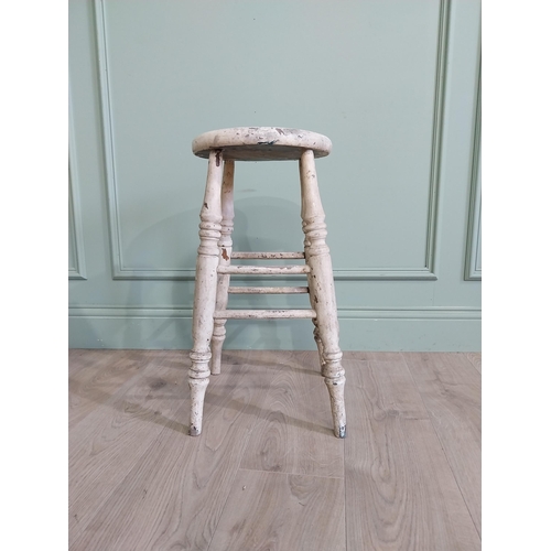 667 - Two early 20th C. pine stools {61 cm H x 33 cm W x 30 cm D and 61 cm H x 33 cm W x 31 cm D}.