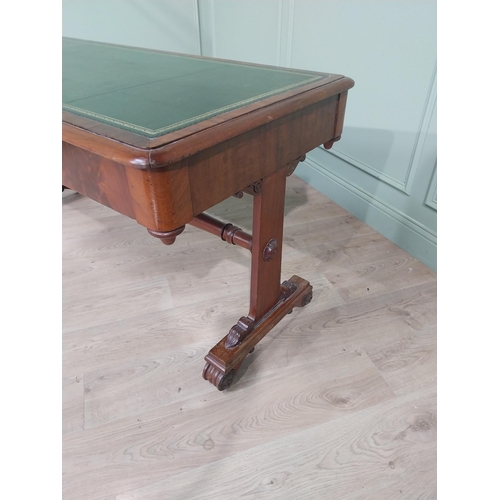 671 - William IV mahogany library table with inset leather top raised on single stretcher and lions paw fe... 