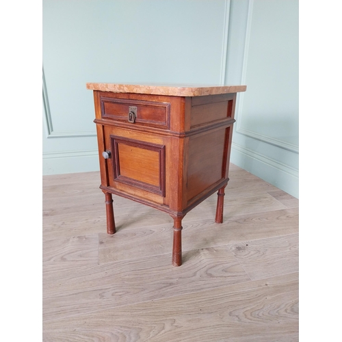 673 - Edwardian mahogany bedside locker with marble top and single drawer over blind door raised on turned... 