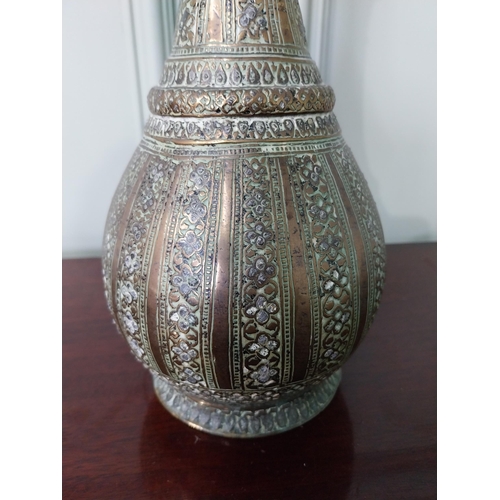 678 - 19th C. Middle Eastern engraved brass vase {29 cm H x 13 cm Dia.}.