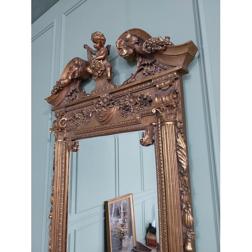 689 - Good quality French gilt pier mirror in the Georgian style decorated with cherubs and swags {185 cm ... 