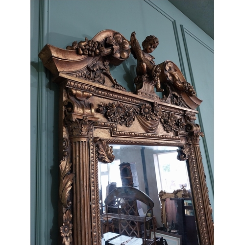 689 - Good quality French gilt pier mirror in the Georgian style decorated with cherubs and swags {185 cm ... 