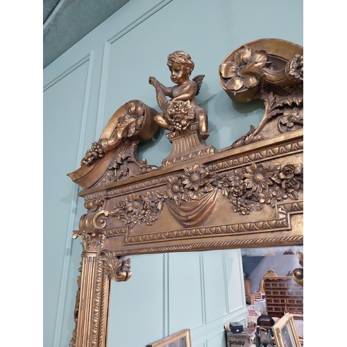 689 - Good quality French gilt pier mirror in the Georgian style decorated with cherubs and swags {185 cm ... 