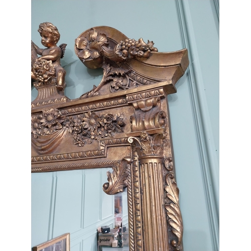 689 - Good quality French gilt pier mirror in the Georgian style decorated with cherubs and swags {185 cm ... 