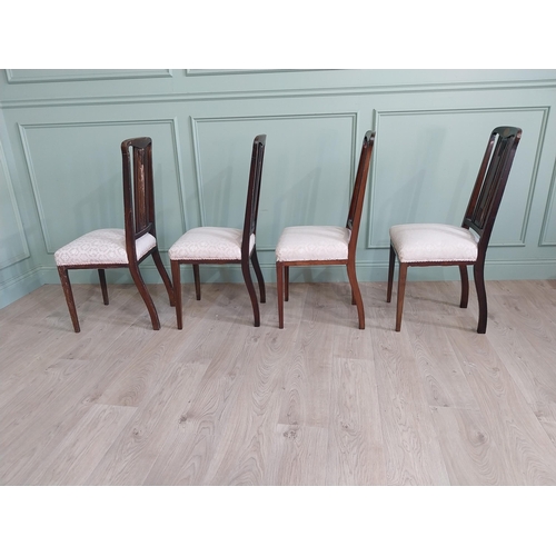 694 - Set of four mahogany and satinwood dining room chairs with upholstered seats raised on square tapere... 