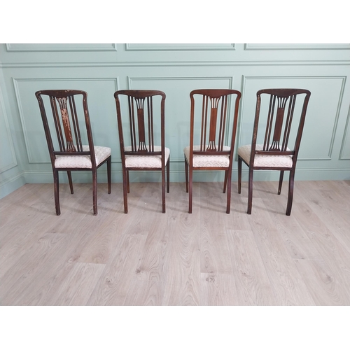 694 - Set of four mahogany and satinwood dining room chairs with upholstered seats raised on square tapere... 