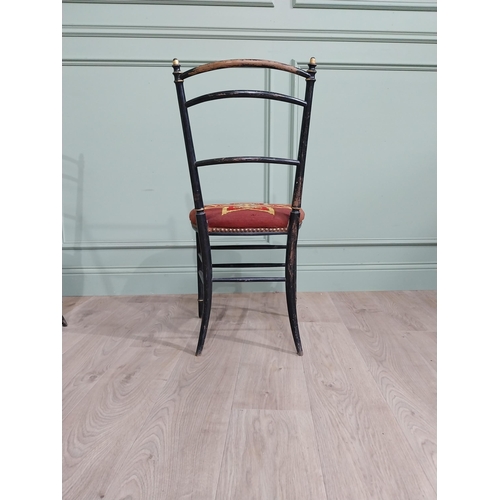 70 - Pair of ebonised bedroom chairs with tapestry upholstered seats raised on tapered legs {86 cm H x 43... 